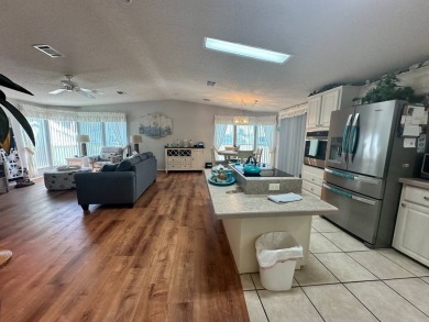 FULLY FURNISHED RETREAT ON 9th FAIRWAY! 2000 Homes of Merit  Lot on Four Lakes Golf Club in Florida - for sale on GolfHomes.com, golf home, golf lot