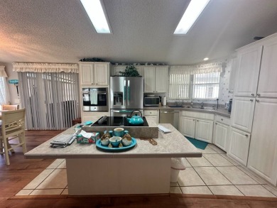 FULLY FURNISHED RETREAT ON 9th FAIRWAY! 2000 Homes of Merit  Lot on Four Lakes Golf Club in Florida - for sale on GolfHomes.com, golf home, golf lot