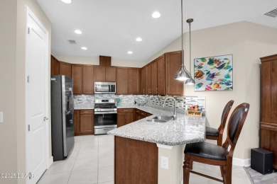 Experience fabulous Florida living in this beautifully appointed on LPGA International Golf Course in Florida - for sale on GolfHomes.com, golf home, golf lot