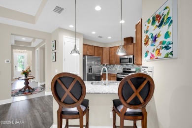 Experience fabulous Florida living in this beautifully appointed on LPGA International Golf Course in Florida - for sale on GolfHomes.com, golf home, golf lot