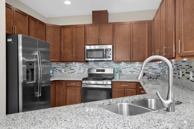 Experience fabulous Florida living in this beautifully appointed on LPGA International Golf Course in Florida - for sale on GolfHomes.com, golf home, golf lot