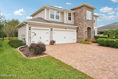 Luxury Living in Palencia, Pond-front Perfection! Welcome to on The Palencia Club in Florida - for sale on GolfHomes.com, golf home, golf lot