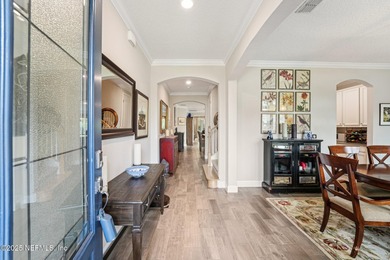 Luxury Living in Palencia, Pond-front Perfection! Welcome to on The Palencia Club in Florida - for sale on GolfHomes.com, golf home, golf lot