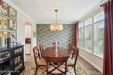 Luxury Living in Palencia, Pond-front Perfection! Welcome to on The Palencia Club in Florida - for sale on GolfHomes.com, golf home, golf lot