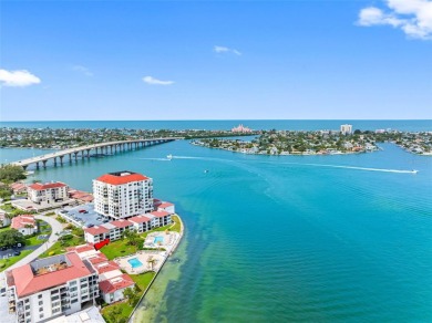 LUXURY WATERFRONT LIVING--DESIGNER FINISHES, POOL, SUNSET AND on Isla Del Sol Yacht and Country Club in Florida - for sale on GolfHomes.com, golf home, golf lot