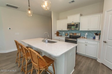 Upgrades galore in this beautiful 4BR/2BA home in the quaint on Ocean Ridge Plantation in North Carolina - for sale on GolfHomes.com, golf home, golf lot