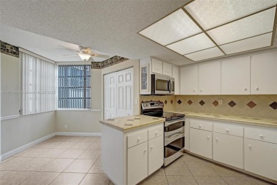 Spacious and bright 3-bedroom corner unit located on the second on Pine Island Ridge Country Club in Florida - for sale on GolfHomes.com, golf home, golf lot