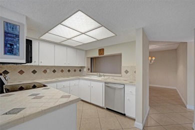 Spacious and bright 3-bedroom corner unit located on the second on Pine Island Ridge Country Club in Florida - for sale on GolfHomes.com, golf home, golf lot