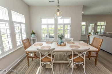 Upgrades galore in this beautiful 4BR/2BA home in the quaint on Ocean Ridge Plantation in North Carolina - for sale on GolfHomes.com, golf home, golf lot