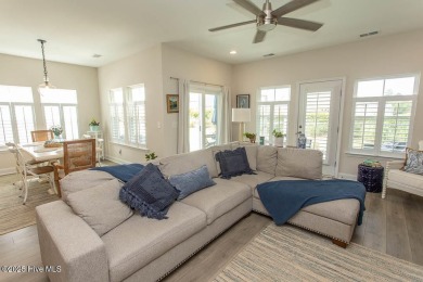 Upgrades galore in this beautiful 4BR/2BA home in the quaint on Ocean Ridge Plantation in North Carolina - for sale on GolfHomes.com, golf home, golf lot