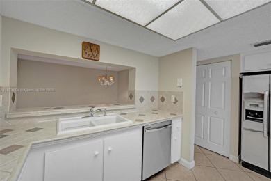 Spacious and bright 3-bedroom corner unit located on the second on Pine Island Ridge Country Club in Florida - for sale on GolfHomes.com, golf home, golf lot
