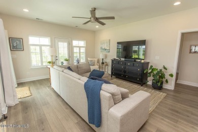 Upgrades galore in this beautiful 4BR/2BA home in the quaint on Ocean Ridge Plantation in North Carolina - for sale on GolfHomes.com, golf home, golf lot
