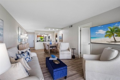 LUXURY WATERFRONT LIVING--DESIGNER FINISHES, POOL, SUNSET AND on Isla Del Sol Yacht and Country Club in Florida - for sale on GolfHomes.com, golf home, golf lot