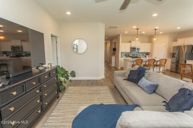 Upgrades galore in this beautiful 4BR/2BA home in the quaint on Ocean Ridge Plantation in North Carolina - for sale on GolfHomes.com, golf home, golf lot