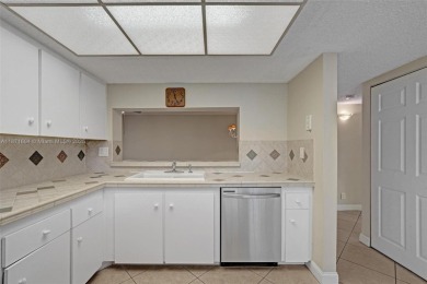 Spacious and bright 3-bedroom corner unit located on the second on Pine Island Ridge Country Club in Florida - for sale on GolfHomes.com, golf home, golf lot
