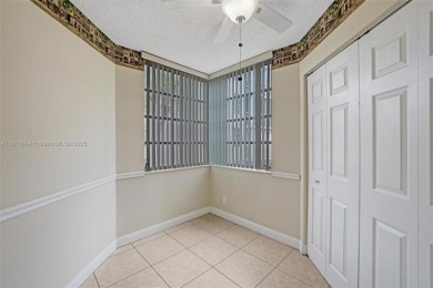 Spacious and bright 3-bedroom corner unit located on the second on Pine Island Ridge Country Club in Florida - for sale on GolfHomes.com, golf home, golf lot