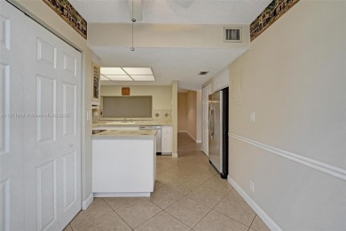 Spacious and bright 3-bedroom corner unit located on the second on Pine Island Ridge Country Club in Florida - for sale on GolfHomes.com, golf home, golf lot