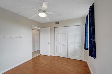 Spacious and bright 3-bedroom corner unit located on the second on Pine Island Ridge Country Club in Florida - for sale on GolfHomes.com, golf home, golf lot