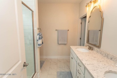 Upgrades galore in this beautiful 4BR/2BA home in the quaint on Ocean Ridge Plantation in North Carolina - for sale on GolfHomes.com, golf home, golf lot