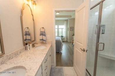 Upgrades galore in this beautiful 4BR/2BA home in the quaint on Ocean Ridge Plantation in North Carolina - for sale on GolfHomes.com, golf home, golf lot