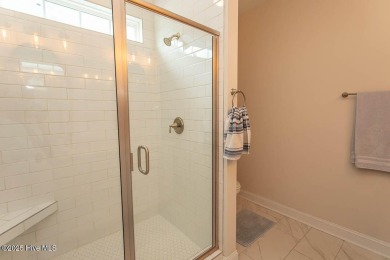 Upgrades galore in this beautiful 4BR/2BA home in the quaint on Ocean Ridge Plantation in North Carolina - for sale on GolfHomes.com, golf home, golf lot