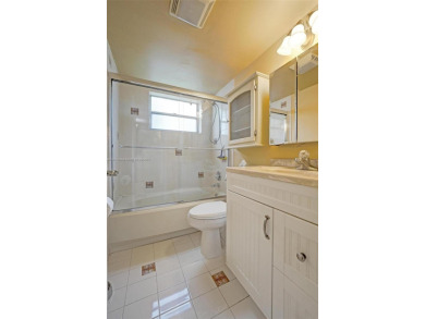 Spacious and bright 3-bedroom corner unit located on the second on Pine Island Ridge Country Club in Florida - for sale on GolfHomes.com, golf home, golf lot