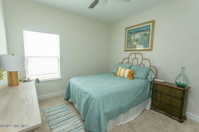 Upgrades galore in this beautiful 4BR/2BA home in the quaint on Ocean Ridge Plantation in North Carolina - for sale on GolfHomes.com, golf home, golf lot