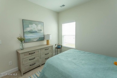 Upgrades galore in this beautiful 4BR/2BA home in the quaint on Ocean Ridge Plantation in North Carolina - for sale on GolfHomes.com, golf home, golf lot