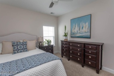 Upgrades galore in this beautiful 4BR/2BA home in the quaint on Ocean Ridge Plantation in North Carolina - for sale on GolfHomes.com, golf home, golf lot