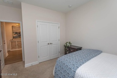 Upgrades galore in this beautiful 4BR/2BA home in the quaint on Ocean Ridge Plantation in North Carolina - for sale on GolfHomes.com, golf home, golf lot