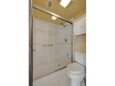 Spacious and bright 3-bedroom corner unit located on the second on Pine Island Ridge Country Club in Florida - for sale on GolfHomes.com, golf home, golf lot