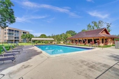 Spacious and bright 3-bedroom corner unit located on the second on Pine Island Ridge Country Club in Florida - for sale on GolfHomes.com, golf home, golf lot