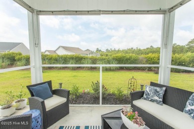Upgrades galore in this beautiful 4BR/2BA home in the quaint on Ocean Ridge Plantation in North Carolina - for sale on GolfHomes.com, golf home, golf lot