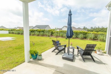 Upgrades galore in this beautiful 4BR/2BA home in the quaint on Ocean Ridge Plantation in North Carolina - for sale on GolfHomes.com, golf home, golf lot