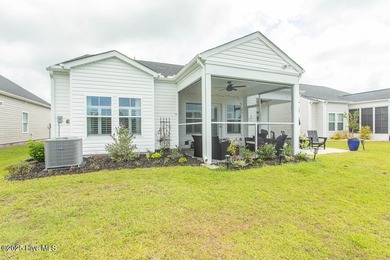 Upgrades galore in this beautiful 4BR/2BA home in the quaint on Ocean Ridge Plantation in North Carolina - for sale on GolfHomes.com, golf home, golf lot