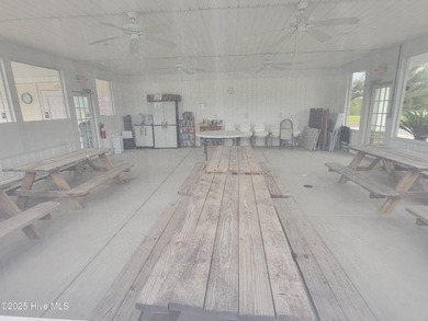 Upgrades galore in this beautiful 4BR/2BA home in the quaint on Ocean Ridge Plantation in North Carolina - for sale on GolfHomes.com, golf home, golf lot