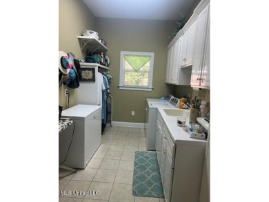 A beautiful 1 owner home built in 1995 located on the fairway of on Colonial Country Club Deerfield in Mississippi - for sale on GolfHomes.com, golf home, golf lot