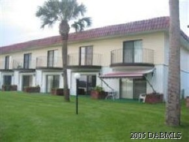 THIS CONDO OFFERS THE BEST OF CONDO LIVING WITH A 9 HOLE GOLF on Ocean Palm Golf Course in Florida - for sale on GolfHomes.com, golf home, golf lot
