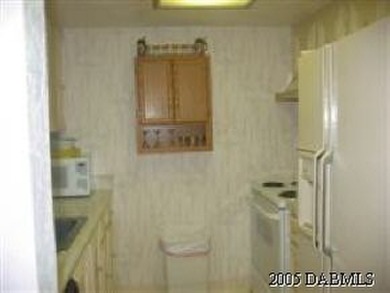 THIS CONDO OFFERS THE BEST OF CONDO LIVING WITH A 9 HOLE GOLF on Ocean Palm Golf Course in Florida - for sale on GolfHomes.com, golf home, golf lot