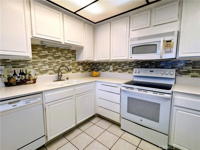 SPECTACULAR VIEWS IN PRESTIGIOUS GATE 14!! 3RD FLOOR END UNIT 3 on Aliso Viejo Country Club in California - for sale on GolfHomes.com, golf home, golf lot