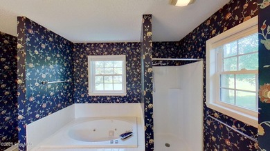 Welcome to this charming brick home in the desirable River Bend on River Bend Golf and Country Club in North Carolina - for sale on GolfHomes.com, golf home, golf lot