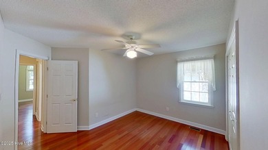 Welcome to this charming brick home in the desirable River Bend on River Bend Golf and Country Club in North Carolina - for sale on GolfHomes.com, golf home, golf lot