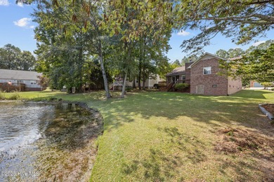 Welcome to this charming brick home in the desirable River Bend on River Bend Golf and Country Club in North Carolina - for sale on GolfHomes.com, golf home, golf lot