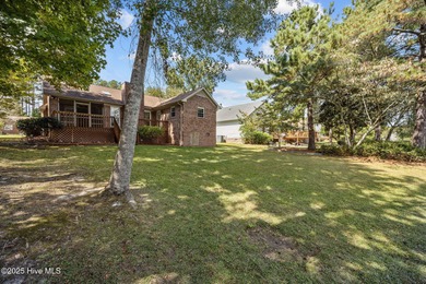 Welcome to this charming brick home in the desirable River Bend on River Bend Golf and Country Club in North Carolina - for sale on GolfHomes.com, golf home, golf lot