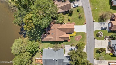 Welcome to this charming brick home in the desirable River Bend on River Bend Golf and Country Club in North Carolina - for sale on GolfHomes.com, golf home, golf lot