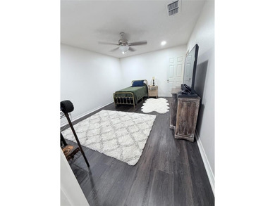 Nestled in a serene, wooded interior lot, this beautifully on Holly Lake Ranch Golf Club in Texas - for sale on GolfHomes.com, golf home, golf lot