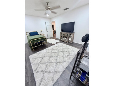 Nestled in a serene, wooded interior lot, this beautifully on Holly Lake Ranch Golf Club in Texas - for sale on GolfHomes.com, golf home, golf lot