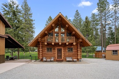Escape the ordinary in this stunning log home sitting on just on Chewelah Golf and Country Club  in Washington - for sale on GolfHomes.com, golf home, golf lot