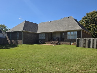 Priced below appraised value with a new roof installed after! on Jackson Country Club in Tennessee - for sale on GolfHomes.com, golf home, golf lot