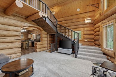 Escape the ordinary in this stunning log home sitting on just on Chewelah Golf and Country Club  in Washington - for sale on GolfHomes.com, golf home, golf lot